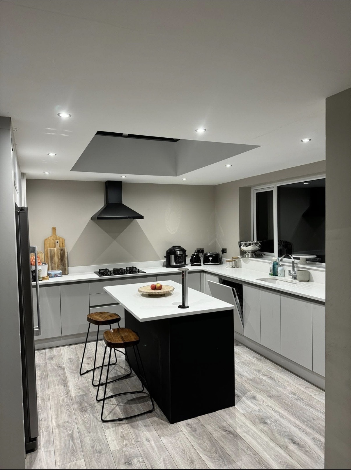 Modern kitchen with fitted ceiling spotlights